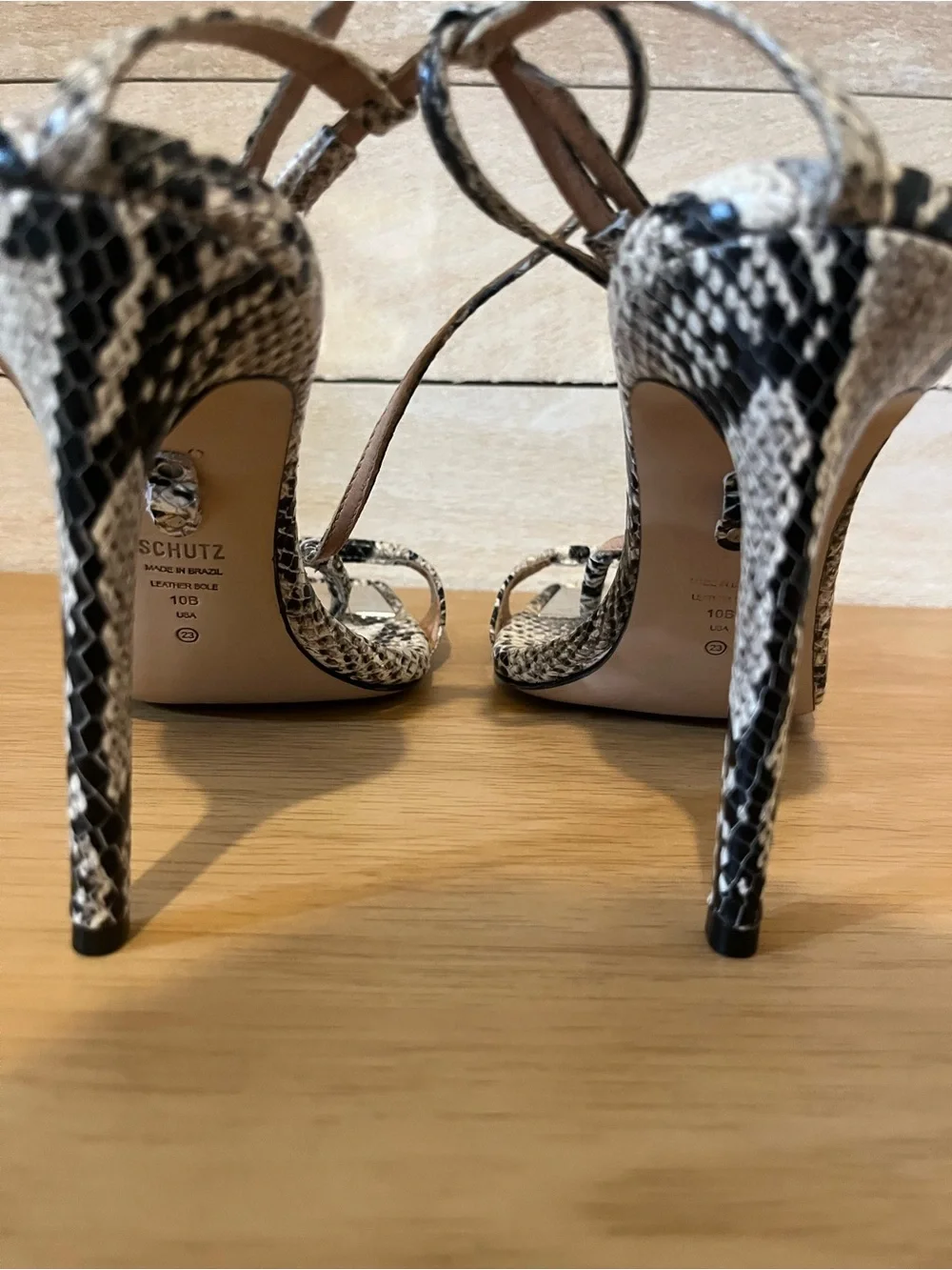 SCHUTZ Snakeskin Print Strappy Heels in Black and Cream